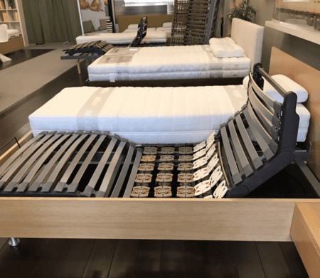 Adjustable Base 1 Modern adjustable bed base with a sturdy frame and motorized head and foot adjustments, ideal for enhancing sleep comfort and support.