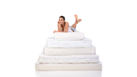 Mattress stack emphasizing Mattress sizes and promoting mattress buying guides on The Mattress Underground.